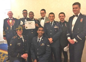 Back row, from left, retired Col. Clay LeGrande, Todd Dixon, Elijah Jones, Evan McMichael, Roberto Duran, Chris Scheuermann, and Jeb Barr. Front, Logan Futrell and Dimitri Bush.